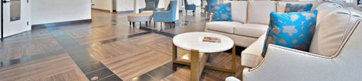 a resident clubhouse with couches chairs and a coffee table at Citrus Heights Apartments, Citrus Heights, CA