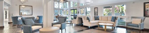 a lobby with couches chairs and tables at The Crest at Citrus Heights Apartments, Citrus Heights, CA,95621