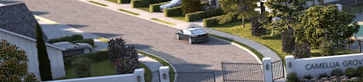 A street view of a residential area with houses and cars.