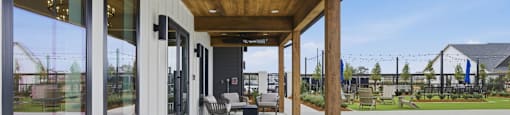 A patio with a table and chairs is shown.