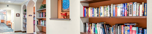 a hallway with bookshelves filled with books in a library