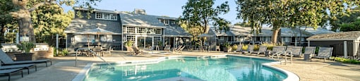 Refreshing swimming pool and lounge chairs at Bay Village, Vallejo, California