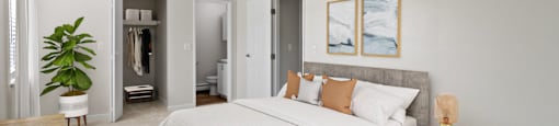 Bedroom flooded with natural light at Rosemont Square Apartments, Randolph, MA, 02368