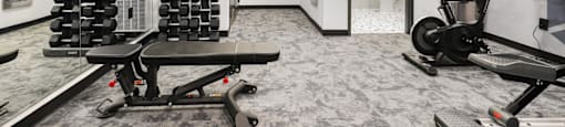 Free weights in the Fitness Center at Switchback on Platte Apartments, Littleton, 80120