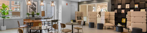 Spacious resident lounge at The Amelia Apartments in Quincy, MA
