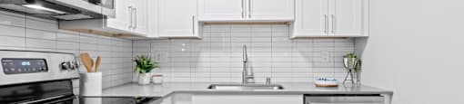 Modern Kitchen with Stainless Steel Appliances at Veranda La Mesa Apartments in La Mesa, CA 91942