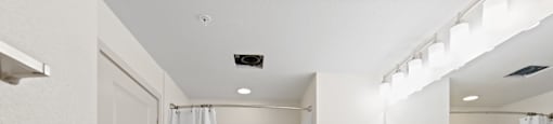 Unit Double Bathroom Vanity and Shower at Aventine Apartments in Hercules, CA 94547