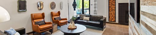 Common Area with Television and Couches at Aventine Apartments in Hercules, CA 94547