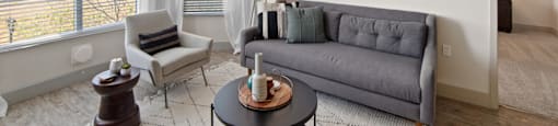Unit Living Room with Large Windows and Natural Light at Aventine Apartments in Hercules, CA 94547