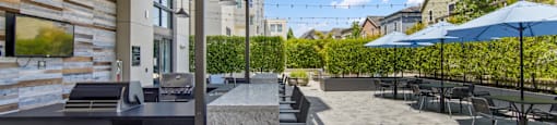 Outdoor Patio with Grill and Seating at Aventine Apartments in Hercules, CA 94547