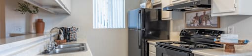 Kitchen at Sunset Winds Apartments in Henderson, NV 89014