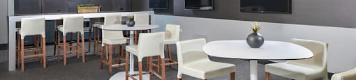 community lounge with tvs | The Montrose Apartments in Chicago, IL