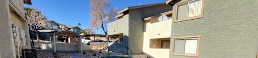 a patio with a picnic table in a courtyard at Sunset Winds Apartments in NV 89014