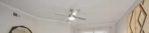 a bedroom with a large bed and a ceiling fan at Sladestone Shadow Creek, Pearland, TX, 77584