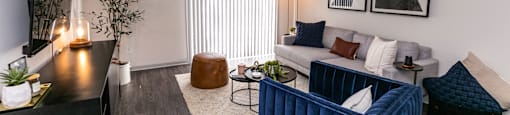 a living room with a couch and a tv at Briarcliff Apartments, Atlanta, 30329