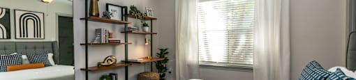 a bedroom with a bed and a ceiling fan at Briarcliff Apartments, Atlanta, GA, 30329