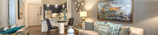 a living room with a couch and a table at South Side Flats, Dallas, 75215