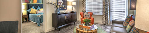a living room with a couch and a table at South Side Flats, Dallas, TX