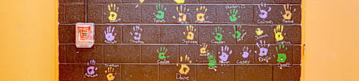 a chalkboard calendar on the wall of a school with the words allied community at Willow Hill Apartments, Justice, 60458