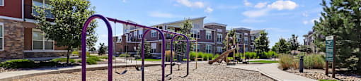 community playground at Apartments at Ridge at Thornton Station Apartments, Colorado, 80229