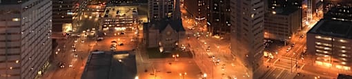 a view of the city at night at Apartments at Denver Place,Denver, CO 80202