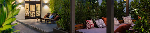 Courtyard seating area at night at Aventine, Hercules, California