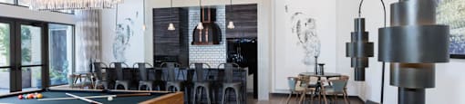 Pool table and kitchen area in newly renovated clubhouse at Aventine, California, 94547