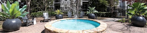 a round swimming pool in a backyard with trees and a house at Deerfield Village, Alpharetta, Georgia