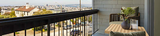 a balcony with a view of the city at Delphine on Diamond, San Francisco, California