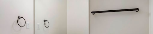 a bathroom with a sink and a mirror and a toilet at Highland Mill Lofts, North Carolina