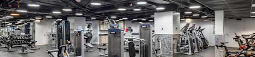 a gym with a lot of exercise equipment in it at North Harbor Tower, Chicago, 60601
