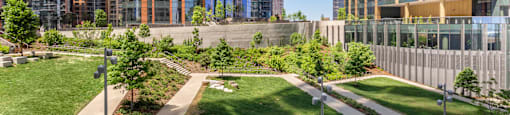 a view of a park with skyscrapers in the background at North Harbor Tower, Chicago