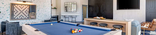 a clubhouse with a pool table and a tv at Sladestone Shadow Creek, Texas, 77584
