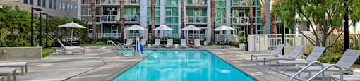 a swimming pool in front of an apartment building  at Vue, California