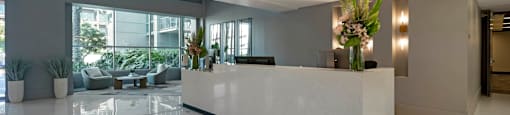 the lobby or reception area of an office building with a reception desk  at Vue, California