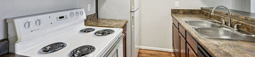 Kitchen with cabinets at Sycamore Square Apartments, Mesa, AZ, 85202