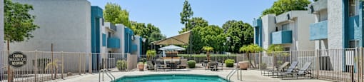 Swimming pool with diving board at Sycamore Square Apartments, Mesa, AZ