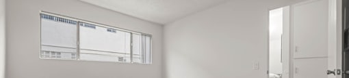 Bedroom with large closet and natural lighting at Sunset Square Apartments, California, 91790