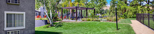 a yard with a house and a gazebo at Monterra Ridge Apartments, California,91351