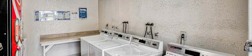 laundry room at Serrano Apartments, West Covina, CA