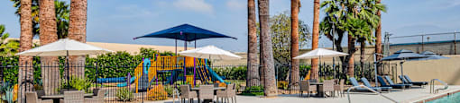 Pool and sitting area at Serrano Apartments, West Covina