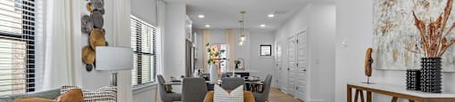 a living room with couches and chairs and a table at The Collection Charlotte in Charlotte, NC, 28205