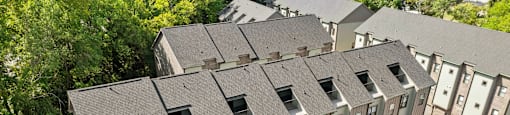 an aerial view of an apartment building on a city street at The Collection Charlotte in Charlotte, NC, 28205