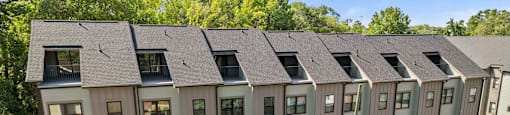 an aerial view of an apartment building with many windows at The Collection Charlotte in Charlotte, NC, 28205