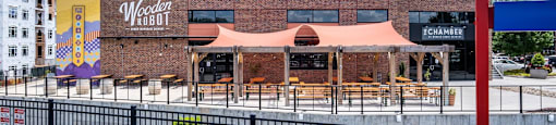 building with a large mural on the side of it at The Collection Charlotte in Charlotte, NC, 28205