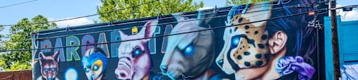 a mural on the side of a building on a city street at The Collection Charlotte in Charlotte, NC, 28205