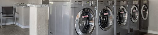 community laundry room with washers and dryers at Glen Hollow,Decatur, GA, 30034