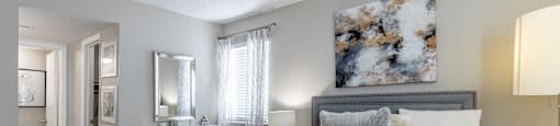 a bedroom with a large bed and a bathroom at Tucker Square, Stone Mountain, GA, 30083