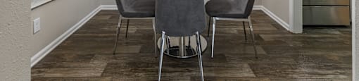 a dining room with a table and chairs. at Tucker Square, Stone Mountain