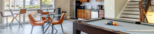Clubhouse with pool table and open spaces at Tucker Square, Georgia